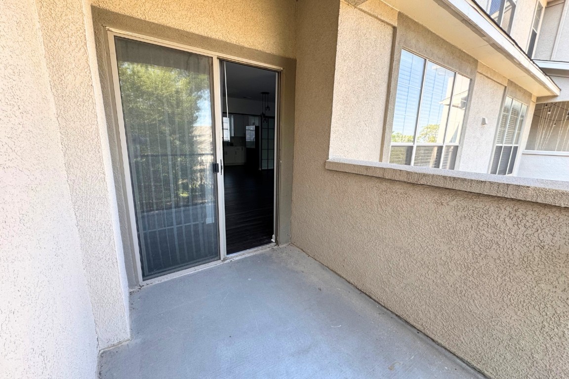11203 Ranch Road 2222, Unit 2203 Austin, TX 78730 - Photo 30 of 34 a view of an empty room with a window