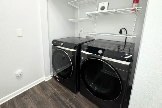 a utility room with dryer and washer