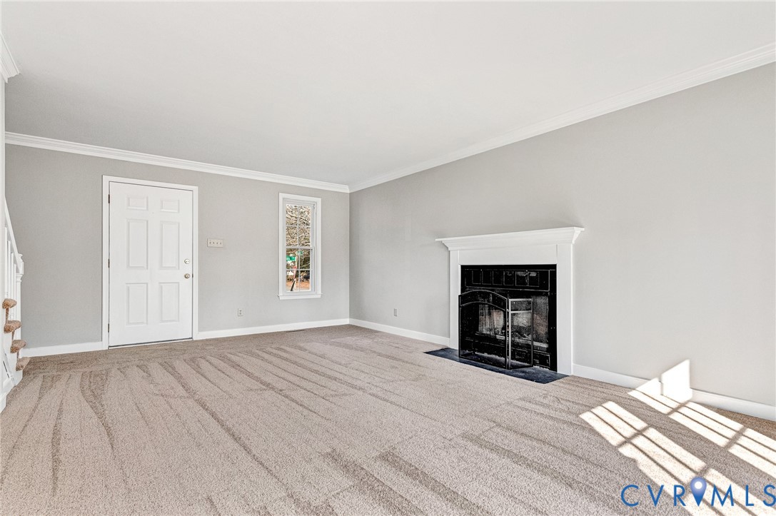 2139 Esquire Road North Chesterfield, VA 23235 - Photo 17 of 35 a view of an empty room with a window and fireplace