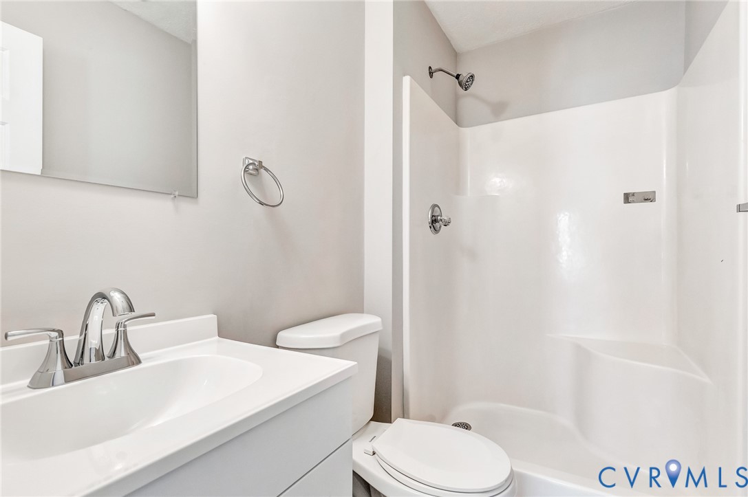 2139 Esquire Road North Chesterfield, VA 23235 - Photo 31 of 35 a bathroom with a sink toilet and shower