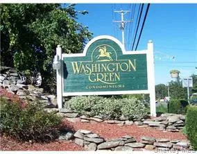 a sign that is on the side of a building