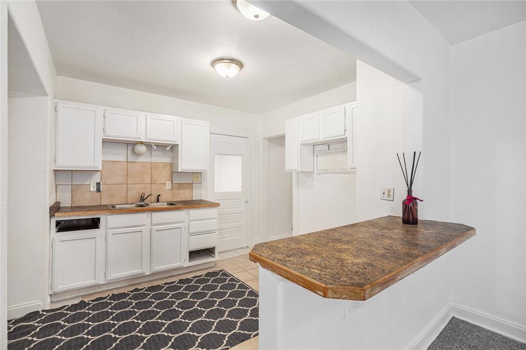 12418 3rd Street Grandview, MO 64030 - Photo 9 of 26