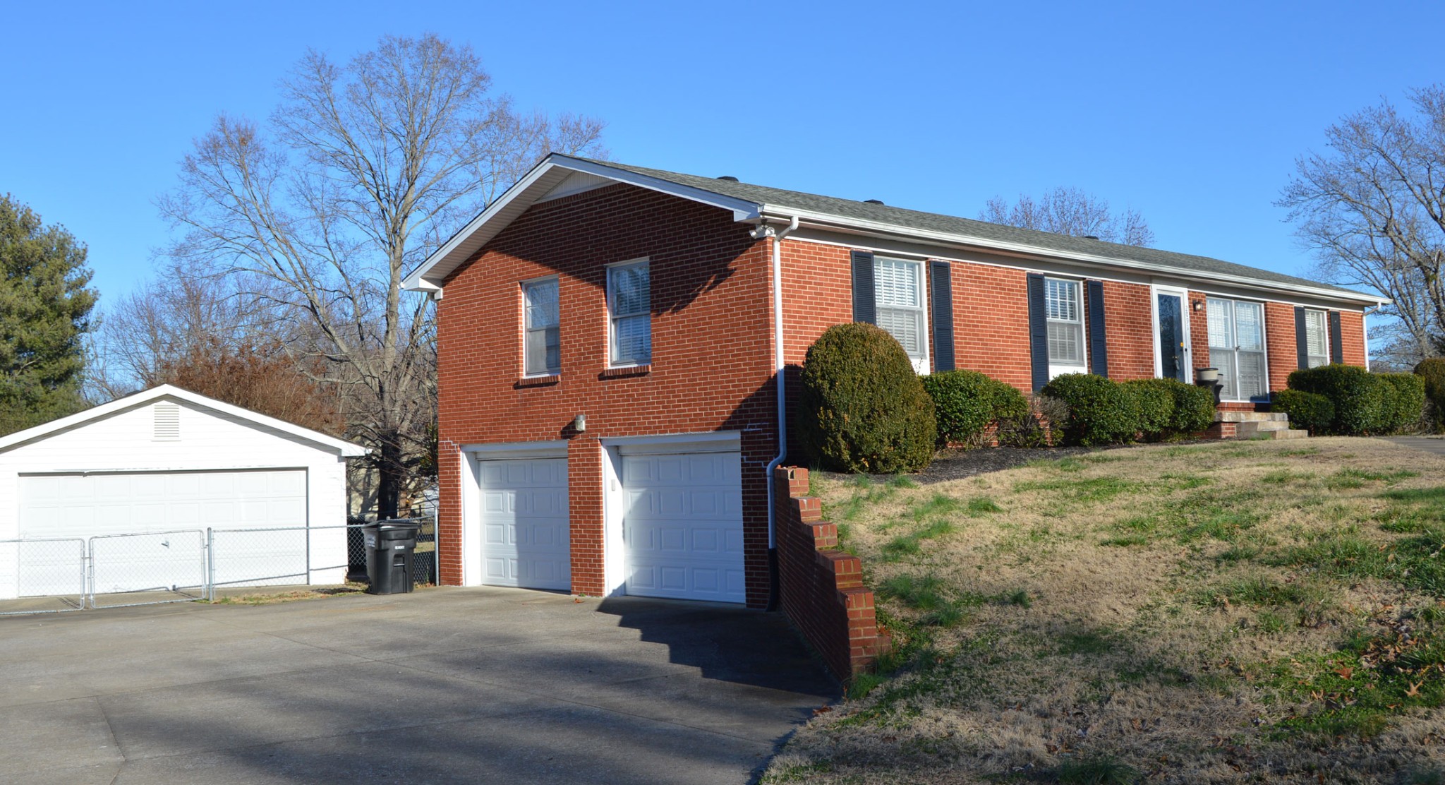 2091 Landon Road Clarksville, TN 37043 - Photo 1 of 21 a front view of a house with garden