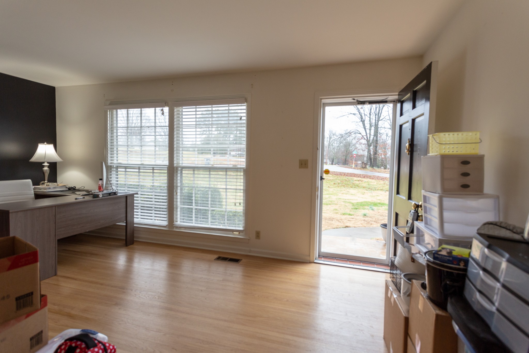 2091 Landon Road Clarksville, TN 37043 - Photo 7 of 21 a view of a livingroom with hardwood floor and a large window
