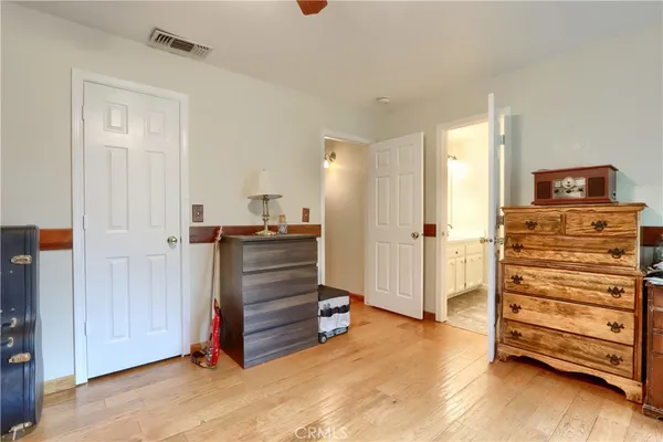 a view of room with furniture and closet