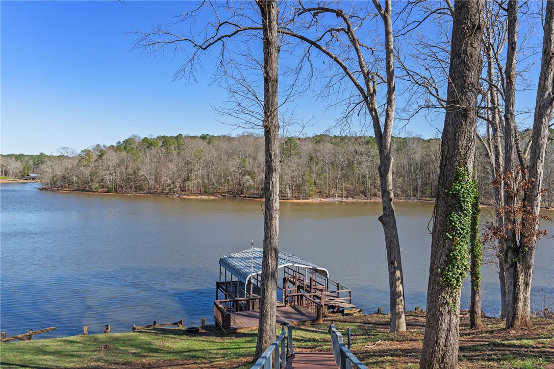 122 Latham Drive Anderson, SC 29621 - Photo 30 of 40 Enjoy tranquil waterfront living with your own private dock and lush natural surroundings.