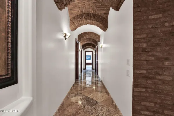 a view of a livingroom with furniture and a table