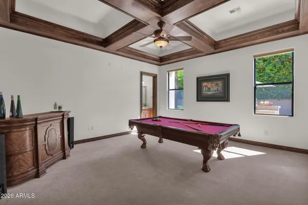 a view of a patio with furniture and a table