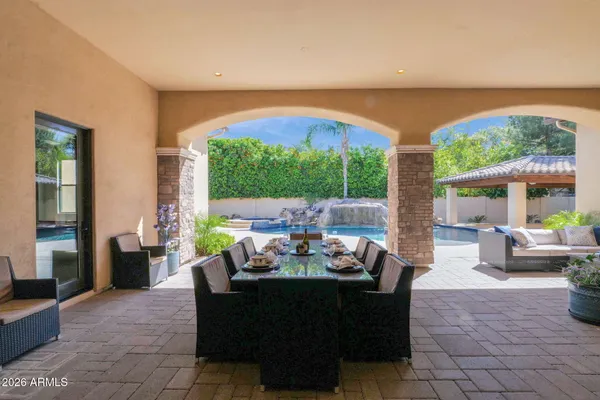 a outdoor living space with furniture and a garden