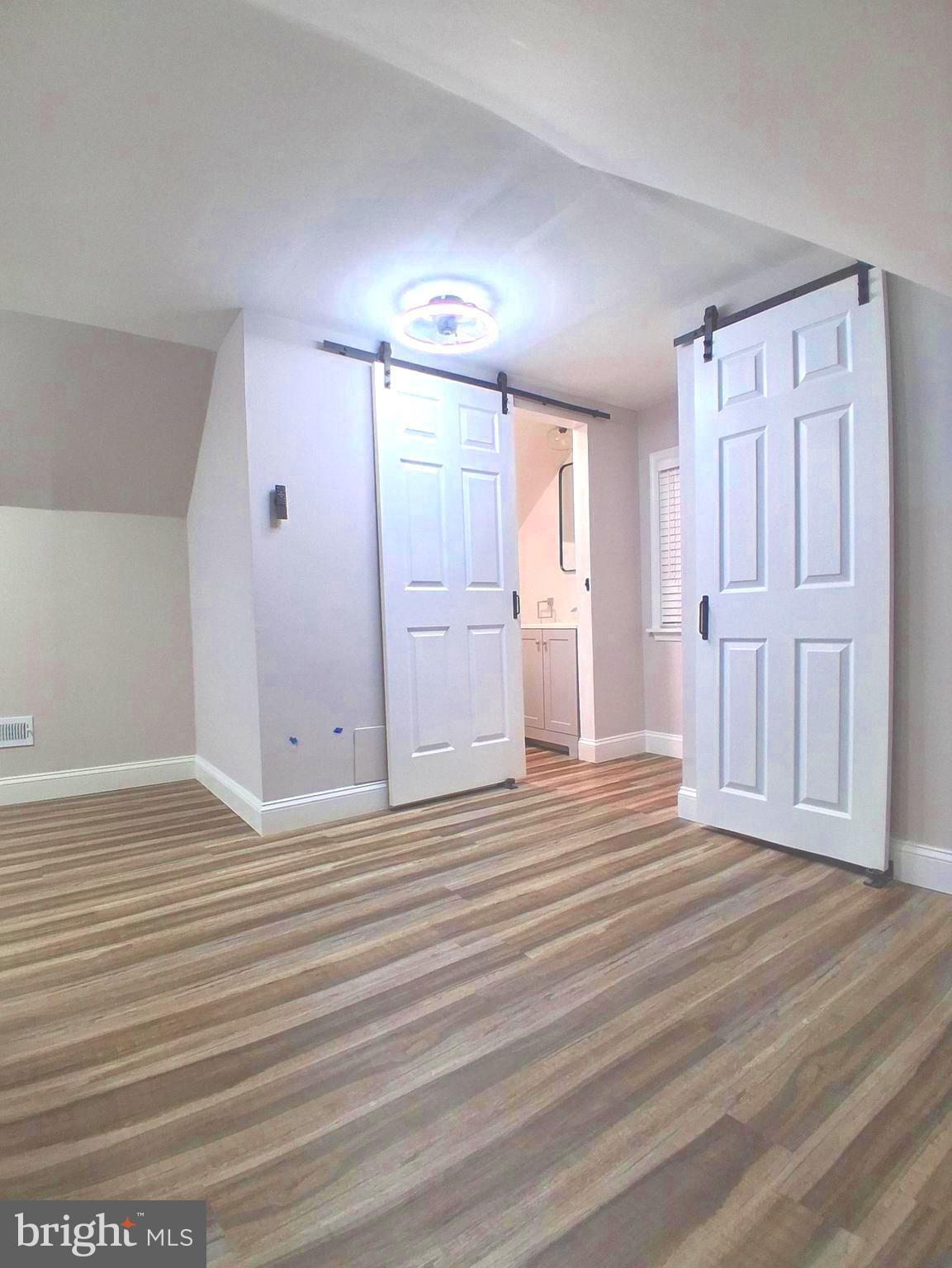 1225 Landover Road Rosedale, MD 21237 - Photo 27 of 48 a view of a livingroom with wooden floor