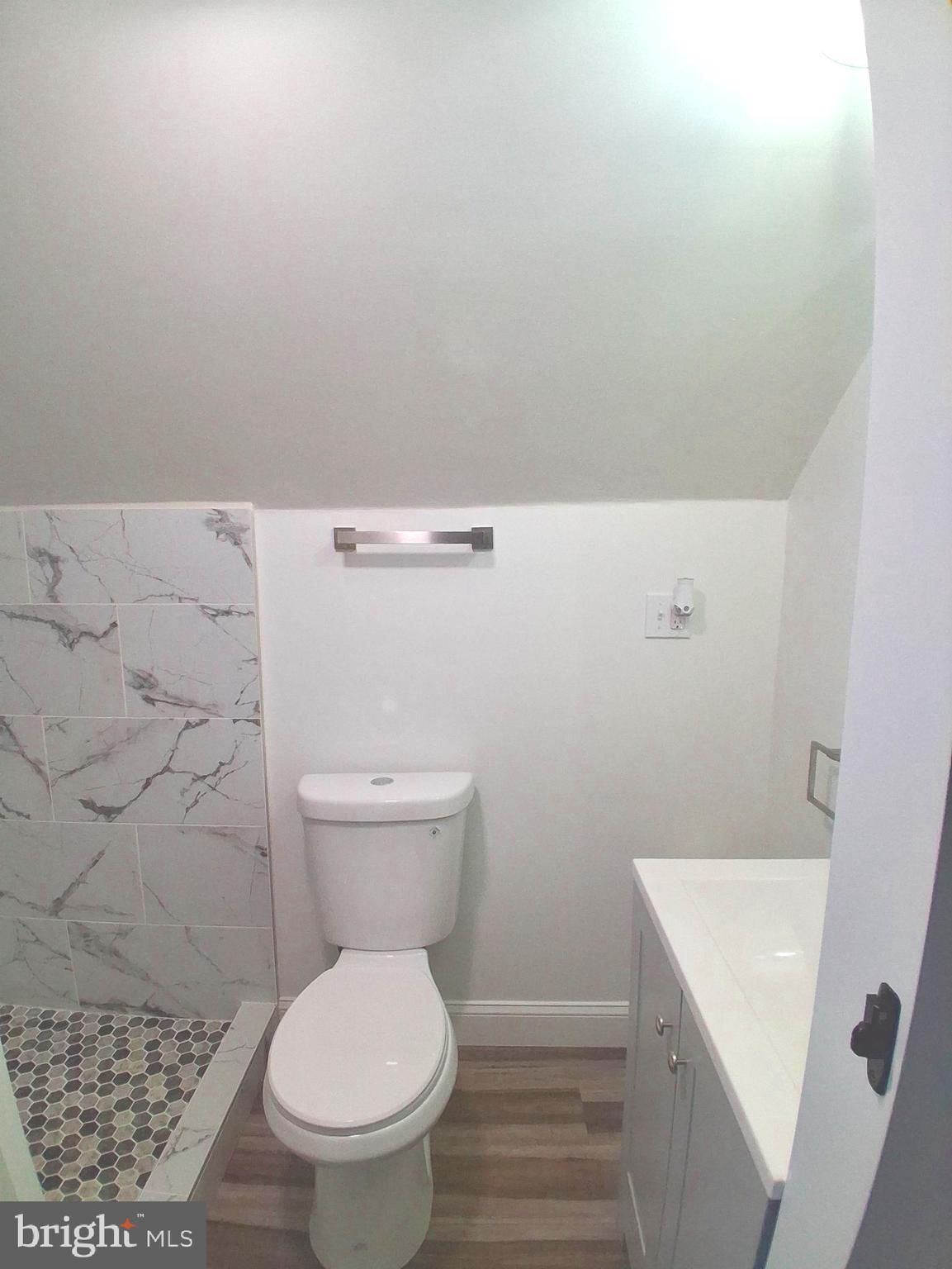 1225 Landover Road Rosedale, MD 21237 - Photo 29 of 48 a bathroom with a toilet and a sink