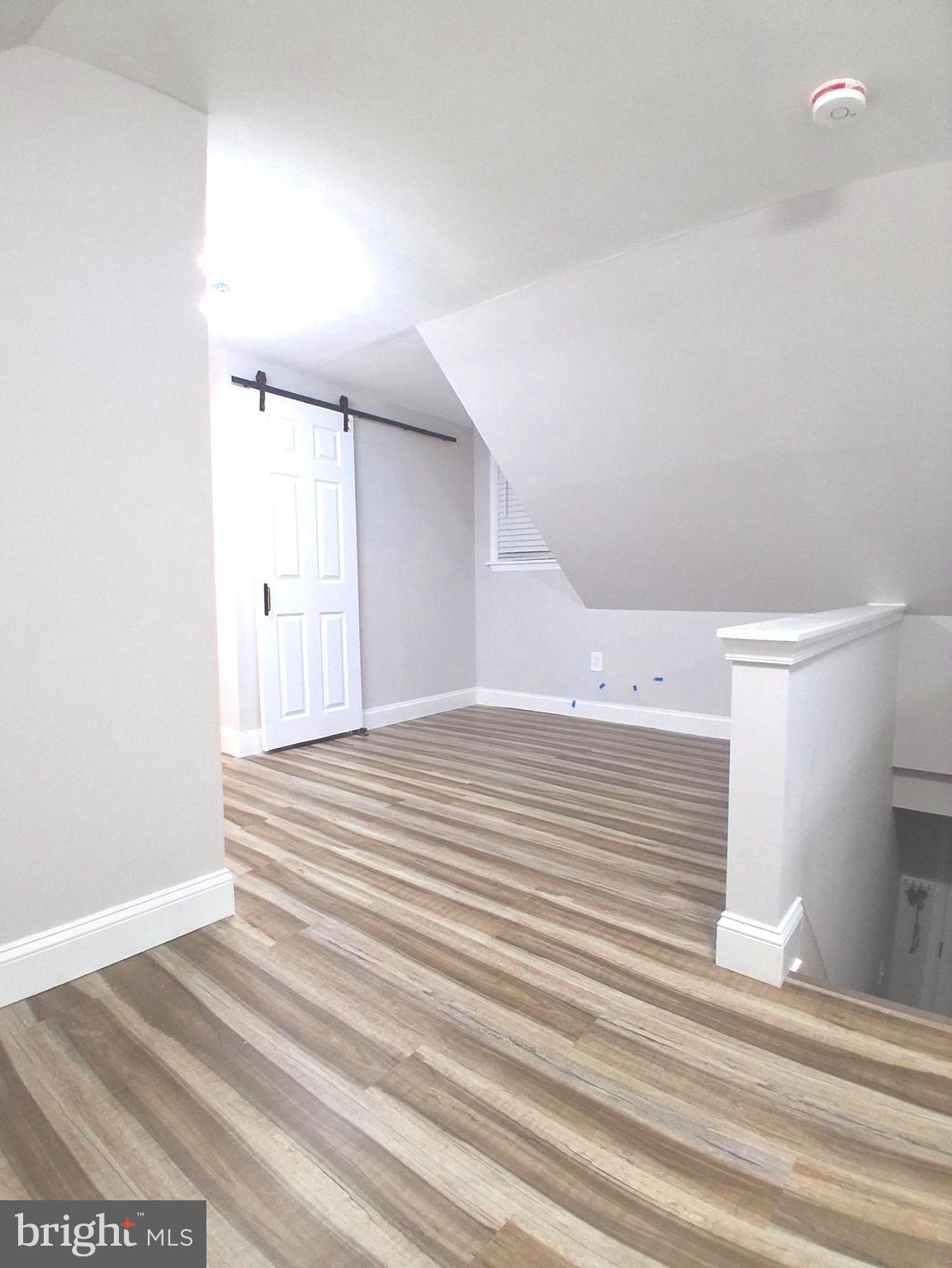 1225 Landover Road Rosedale, MD 21237 - Photo 30 of 48 a view of a room with wooden floor