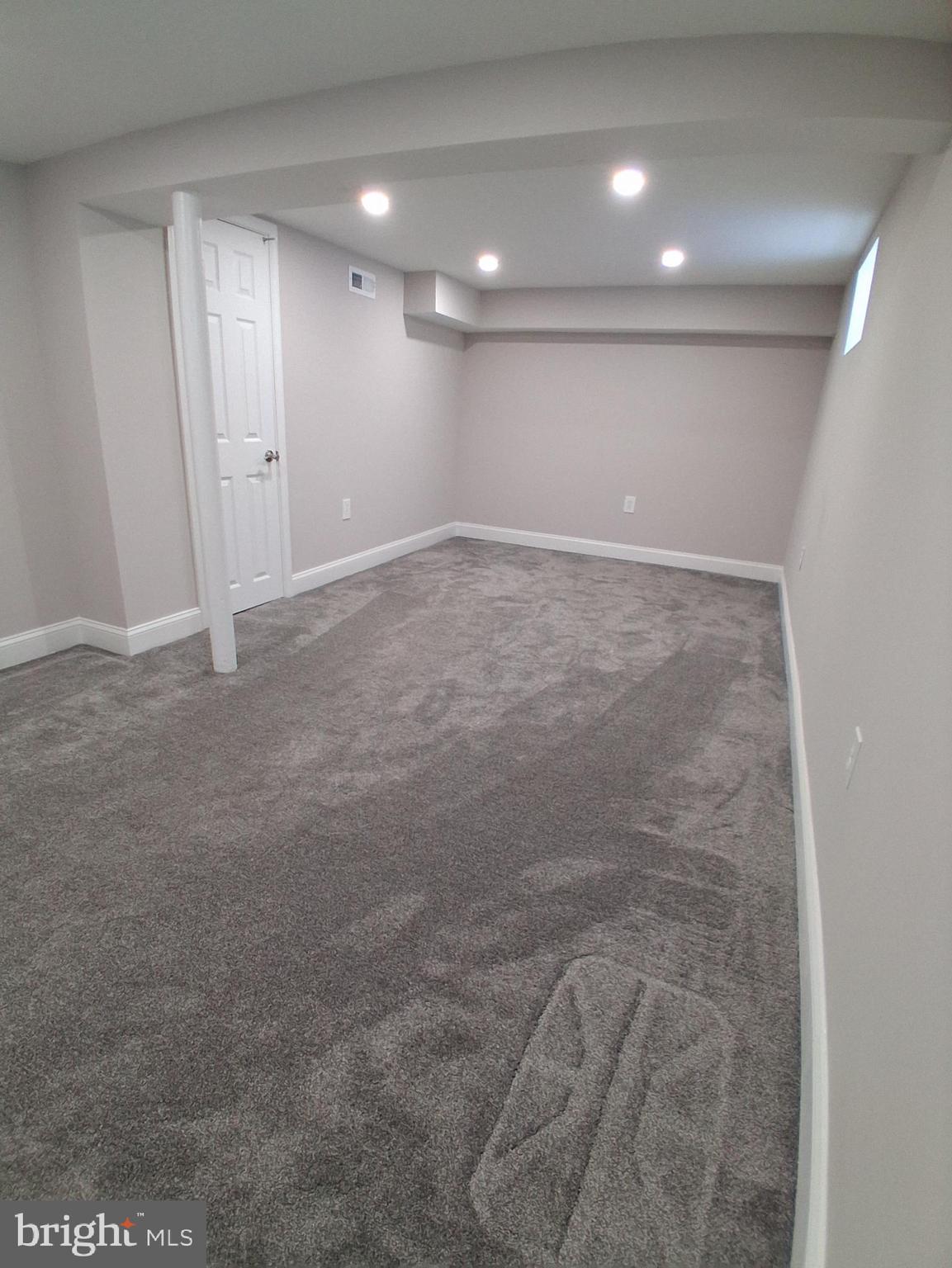 1225 Landover Road Rosedale, MD 21237 - Photo 37 of 48 an empty room with an entryway