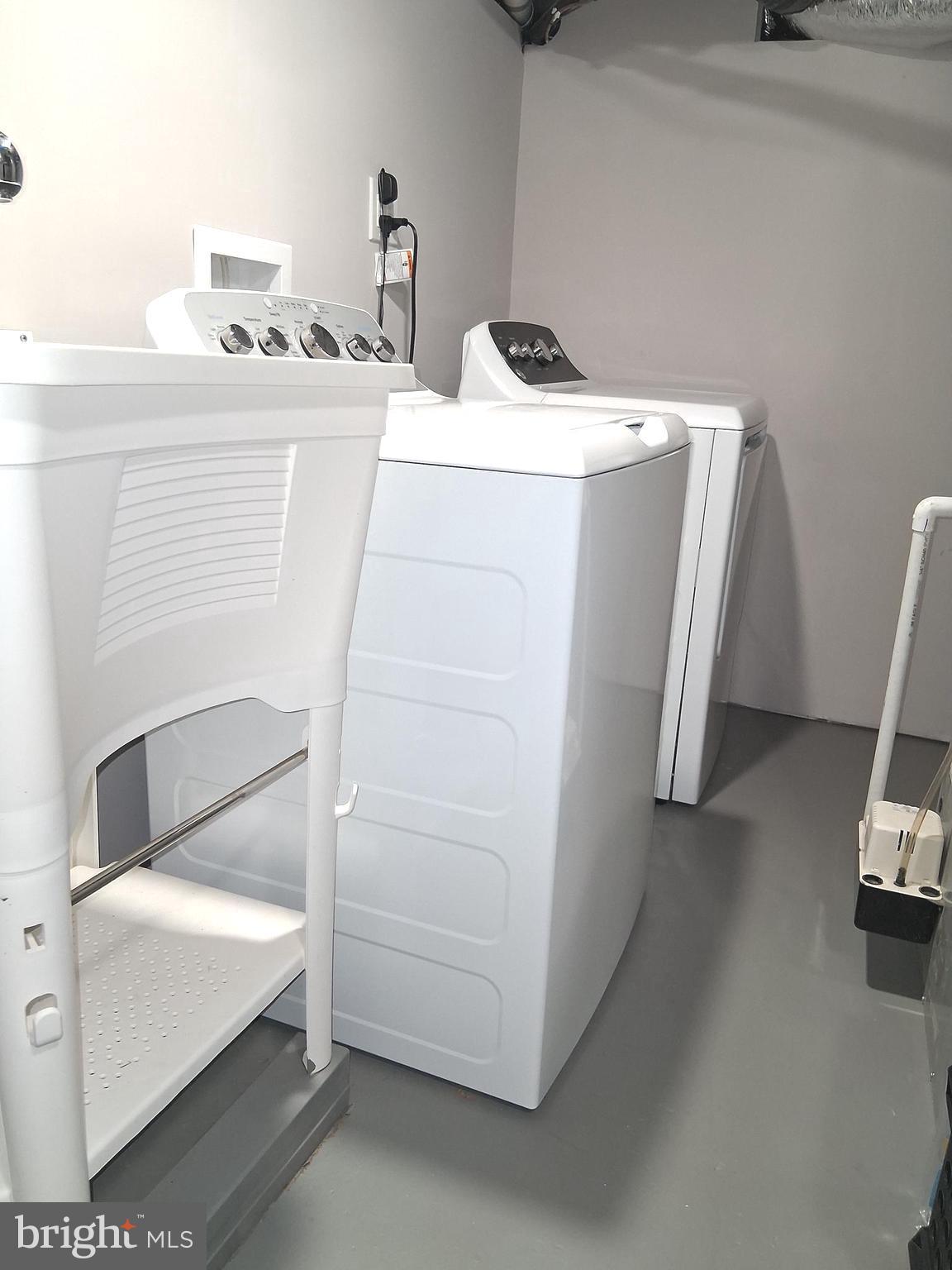 1225 Landover Road Rosedale, MD 21237 - Photo 40 of 48 a utility room with dryer and washer