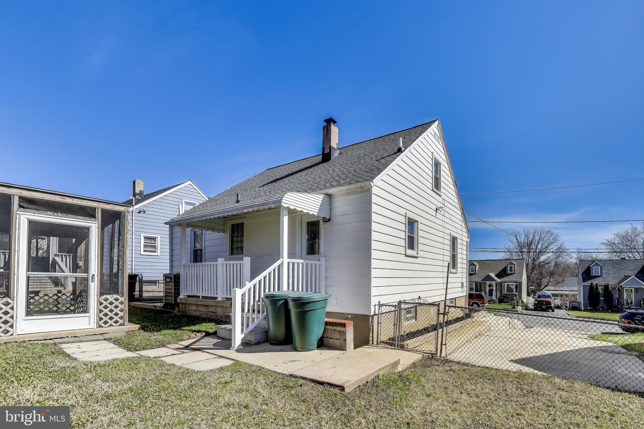 1225 Landover Road Rosedale, MD 21237 - Photo 45 of 48 a front view of a house with garden