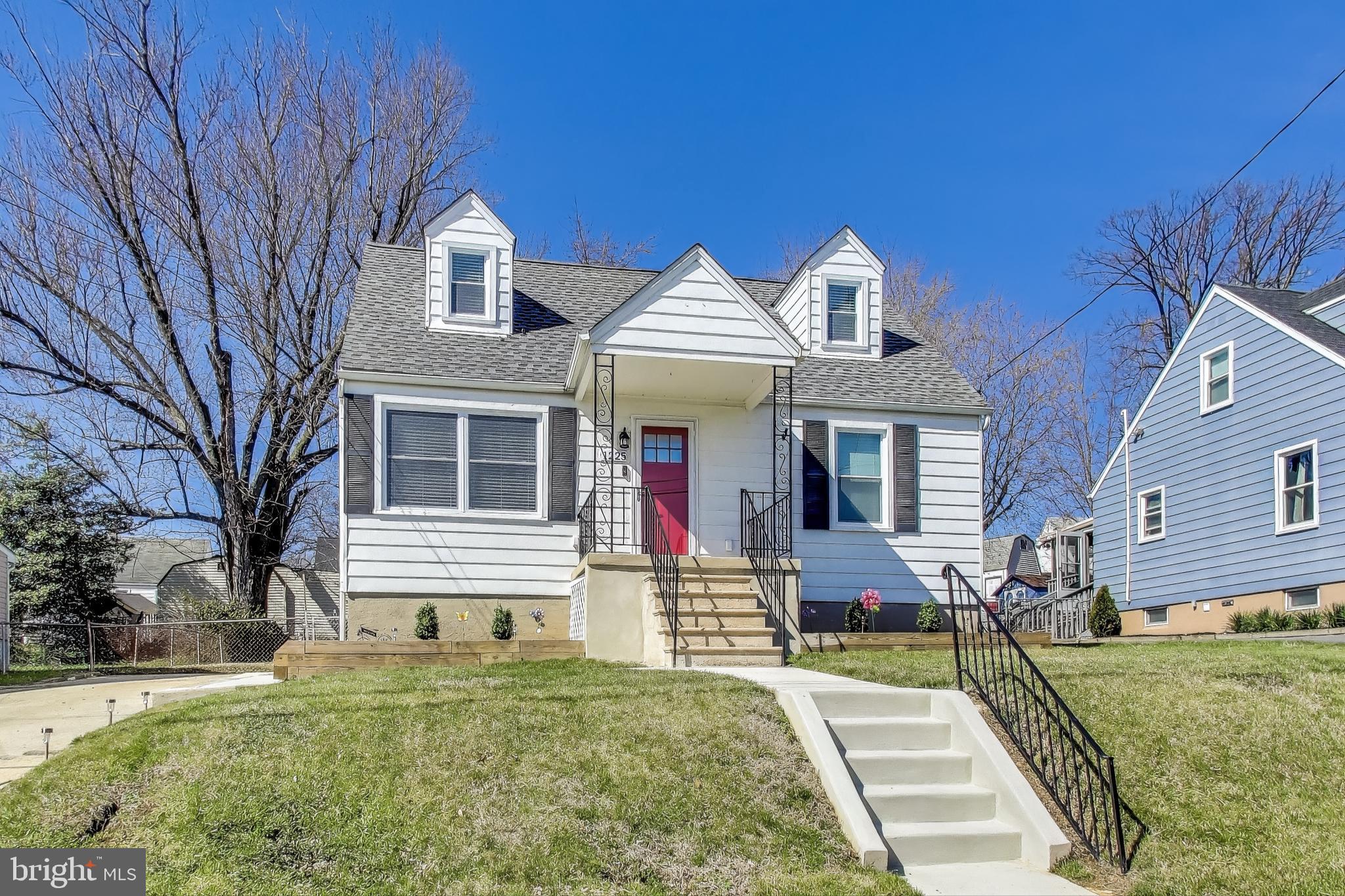 1225 Landover Road Rosedale, MD 21237 - Photo 48 of 48 a front view of a house with garden