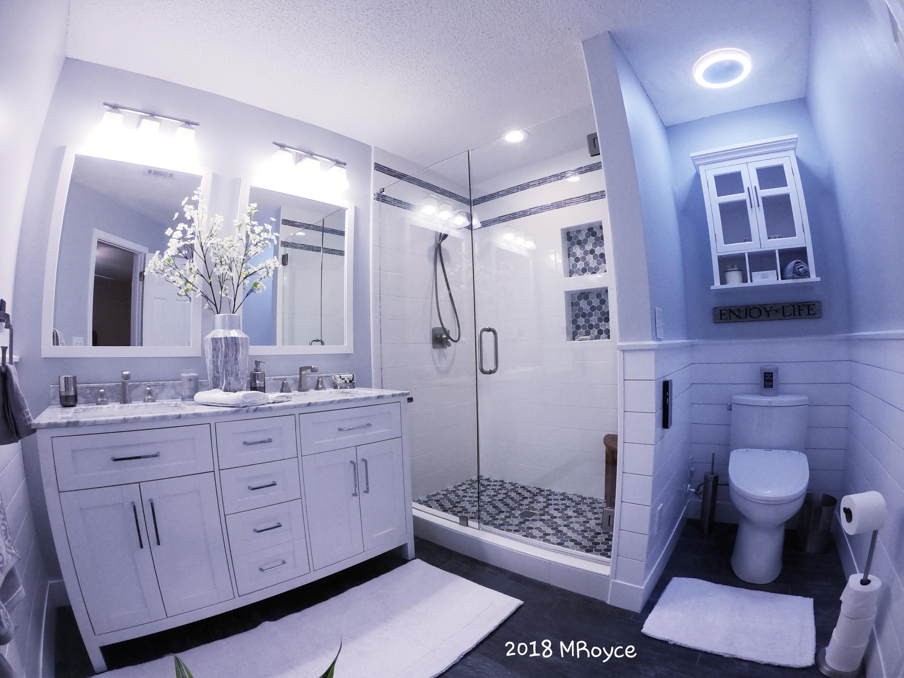 489 Keystone Road Mary Esther, FL 32569 - Photo 17 of 26 a bathroom with a double vanity sink toilet and shower