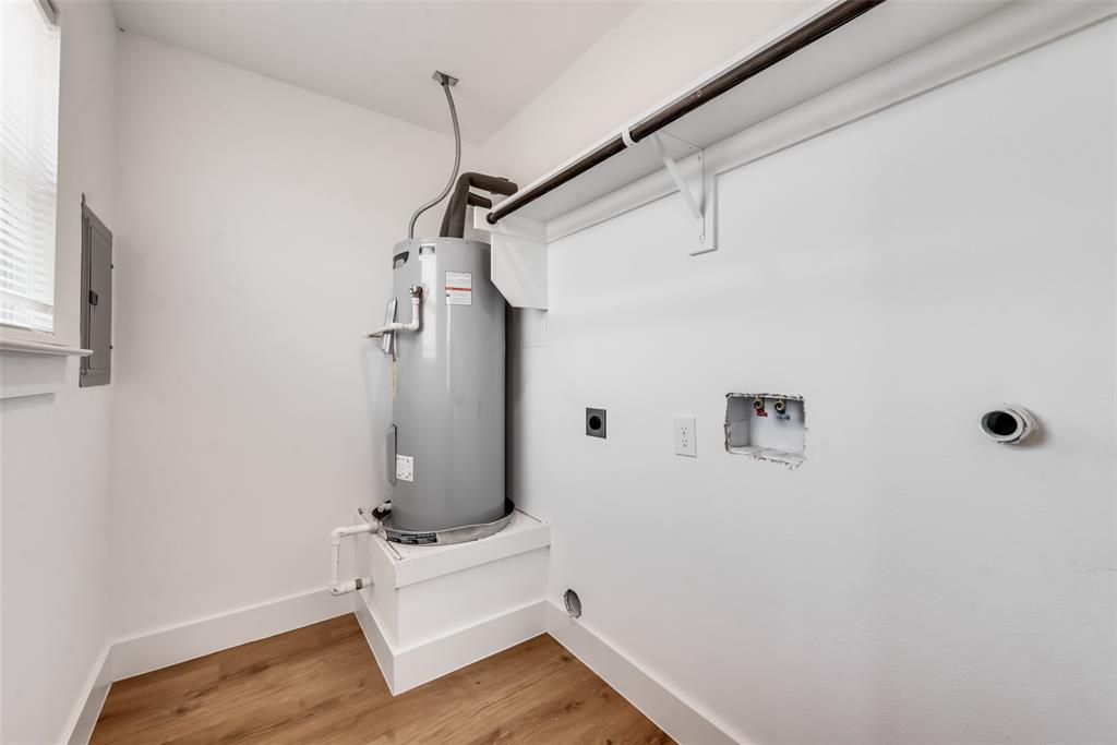 114 Nail Court, Unit 100 Decatur, TX 76234 - Photo 7 of 14 a view of an entryway with wooden floor