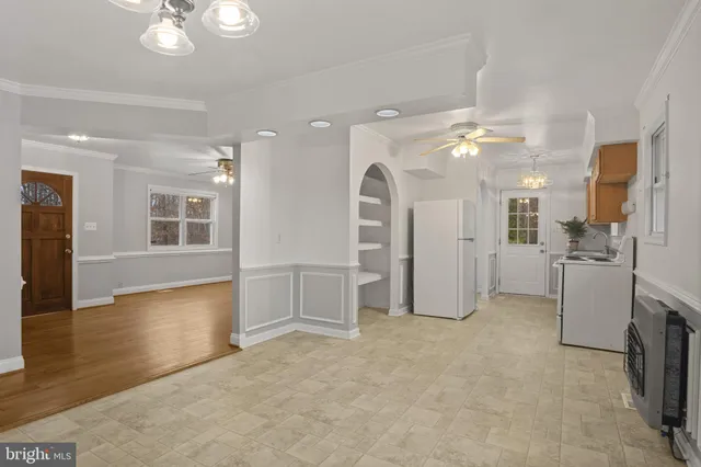 a view of a livingroom with a kitchen