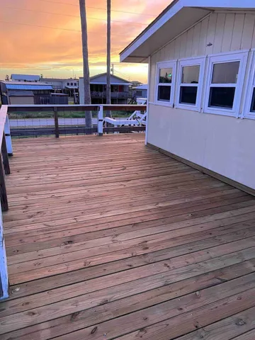 a view of a terrace with wooden floor