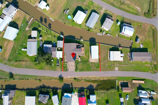 an aerial view of a golf course with lawn chairs