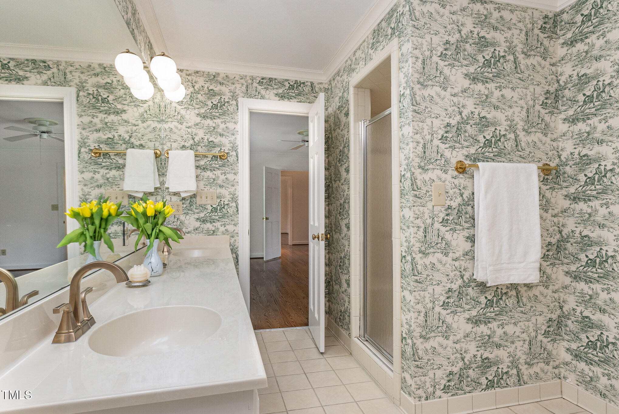 6909 Brook Ridge Court Raleigh, NC 27615 - Photo 19 of 60 Primary bath with dual vanities, tub and shower