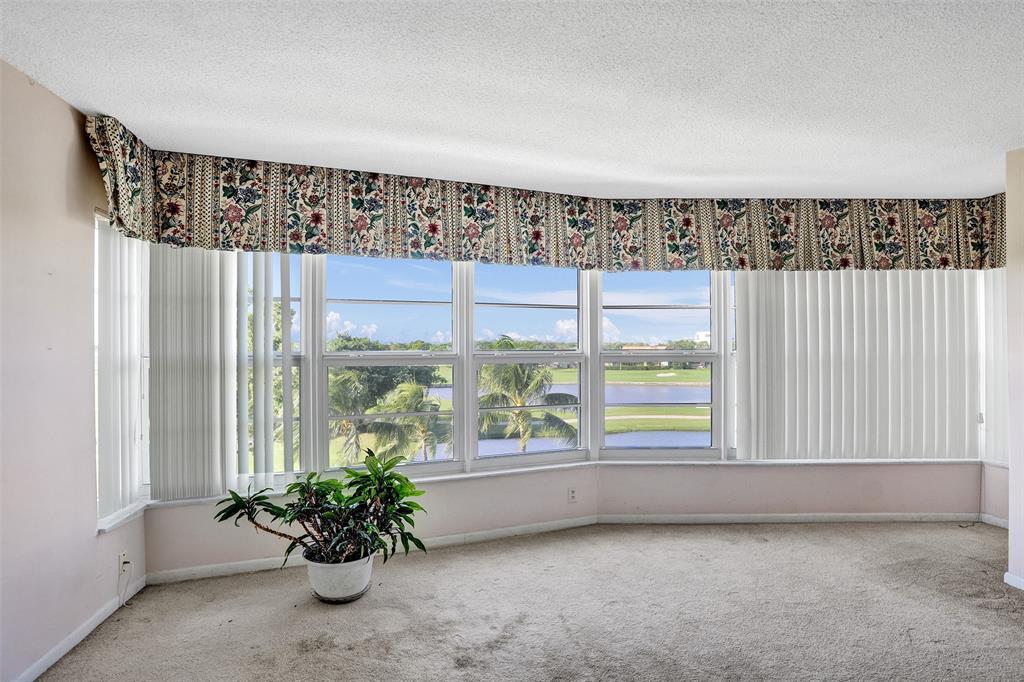 2500 Northeast 48th Lane, Unit 403 Fort Lauderdale, FL 33308 - Photo 2 of 24 a view of an empty room with a window