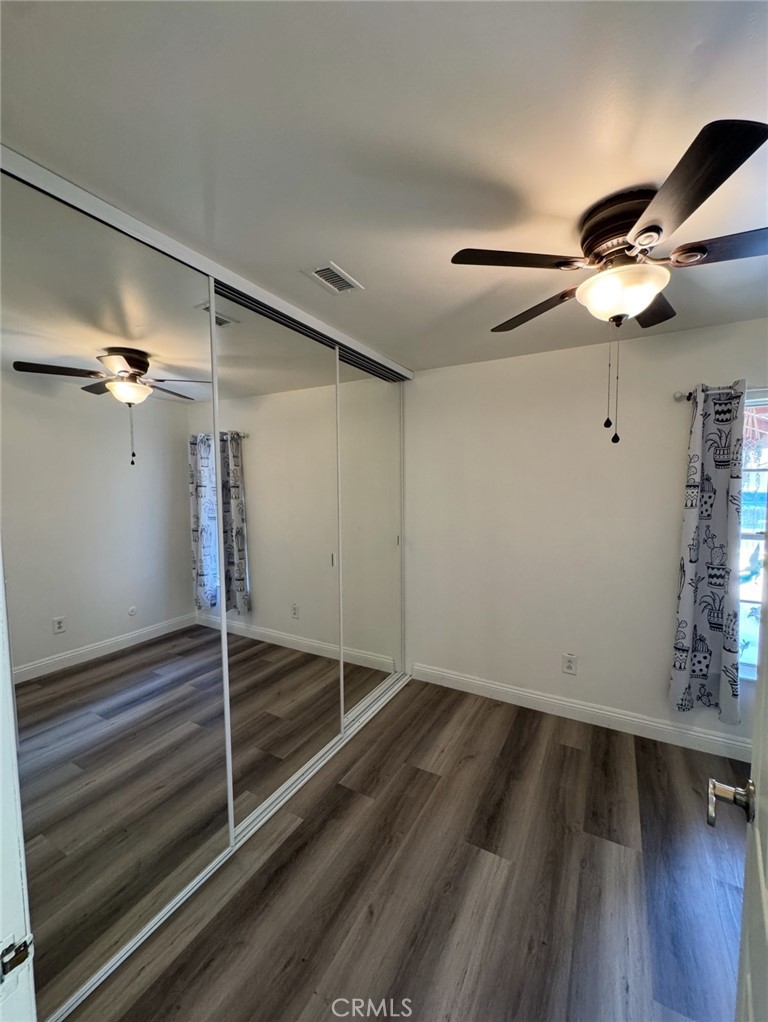 7627 Key W Drive Riverside, CA 92503 - Photo 3 of 7 a view of empty room with wooden floor