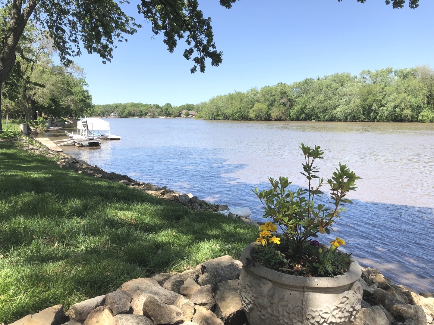 3137 River Road Kankakee, IL 60901 - Photo 36 of 44 a view of a lake with a yard