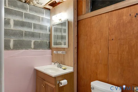 a view of a room with wooden shelves