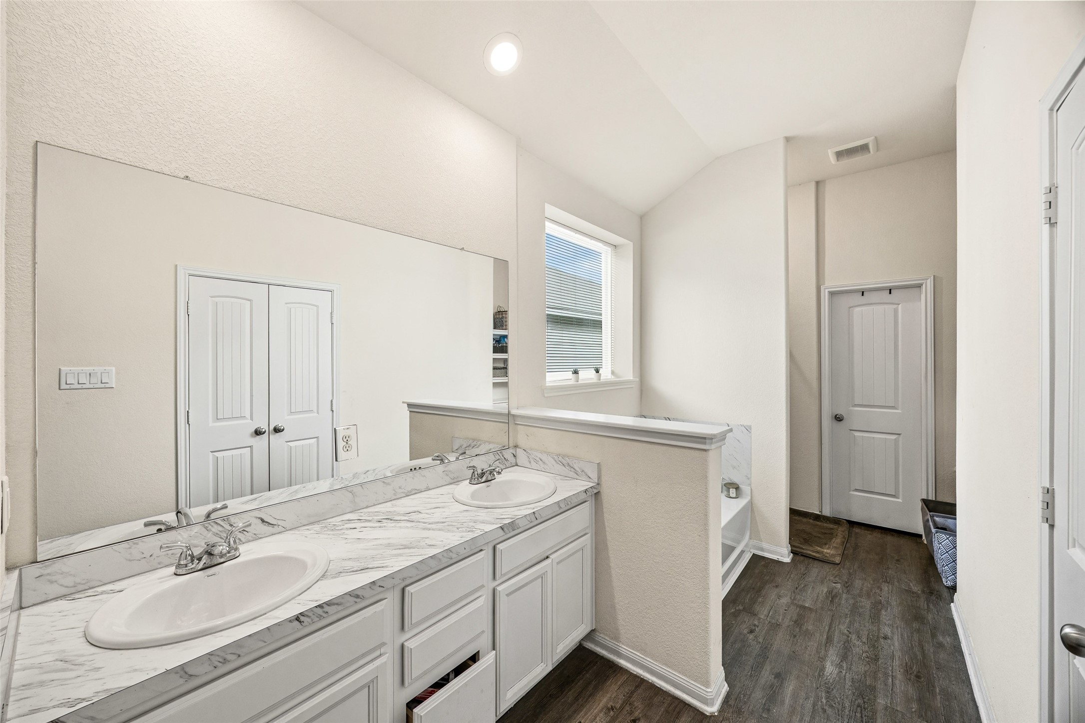 156 County Road Cleveland, TX 77327 - Photo 20 of 25 a bathroom with a granite countertop sink and a mirror