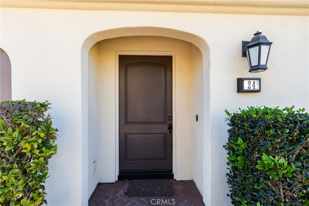 24 Oakfield Irvine, CA 92620 - Photo 2 of 30 a view of a door and garage