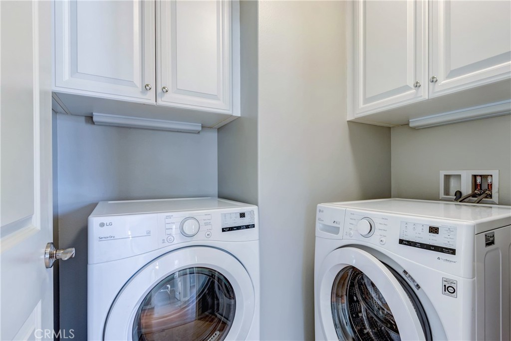 24 Oakfield Irvine, CA 92620 - Photo 22 of 30 a utility room with dryer and washer