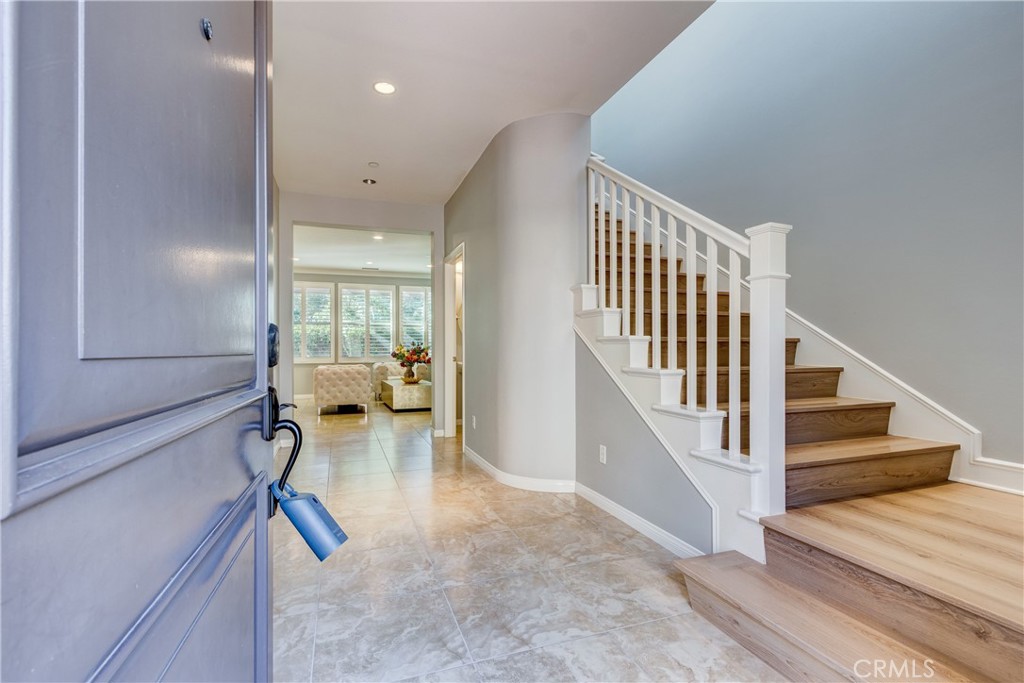 24 Oakfield Irvine, CA 92620 - Photo 3 of 30 a view of staircase with living room and white walls