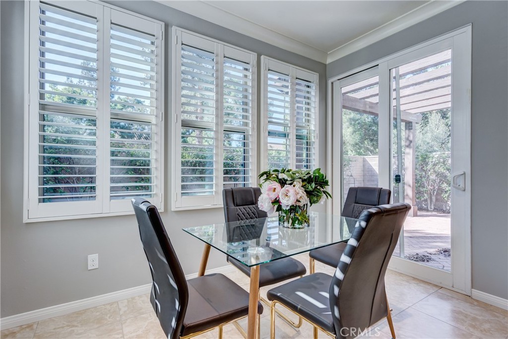 24 Oakfield Irvine, CA 92620 - Photo 10 of 30 a dining room with furniture and window