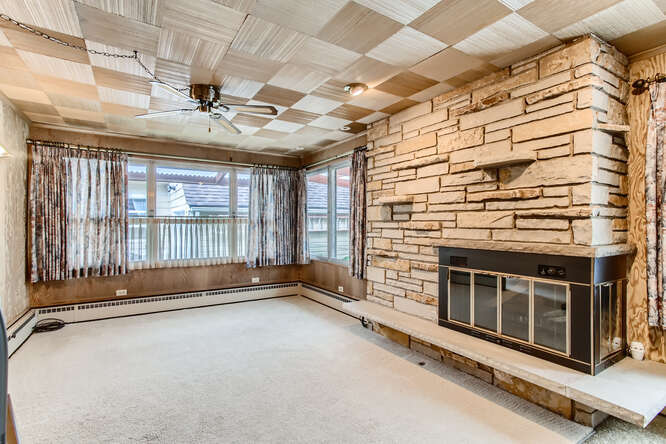 352 South Commonwealth Avenue Elgin, IL 60123 - Photo 12 of 29 a view of an empty room with a fireplace