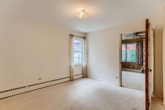 352 South Commonwealth Avenue Elgin, IL 60123 - Photo 16 of 29 an empty room with windows