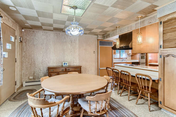 352 South Commonwealth Avenue Elgin, IL 60123 - Photo 6 of 29 a view of a dining room with furniture and wooden floor