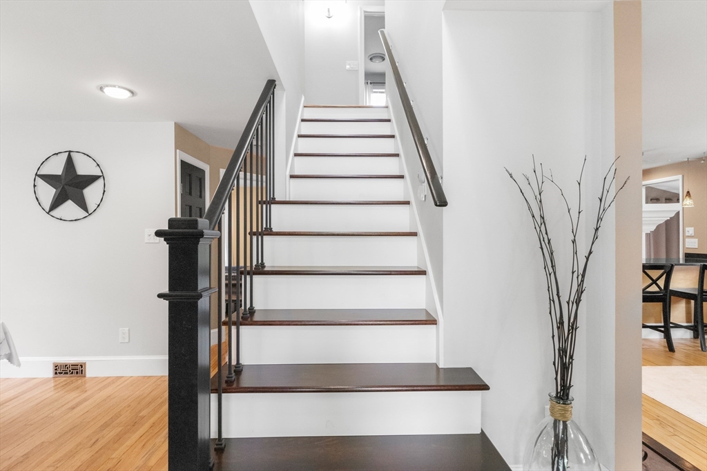21 Leggs Hill Road Marblehead, MA 01945 - Photo 15 of 38 a view of entryway with wooden floor and stairs