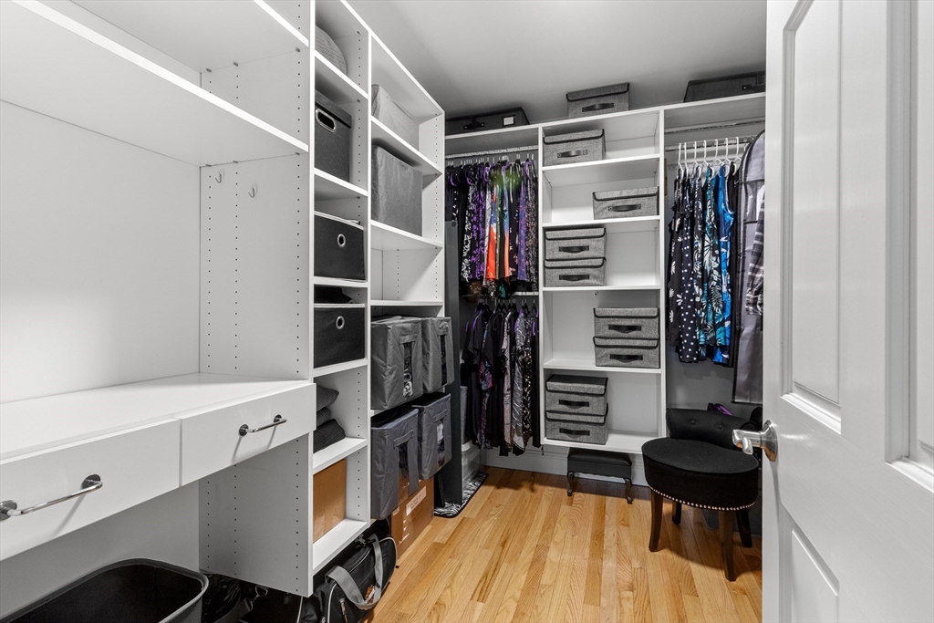 21 Leggs Hill Road Marblehead, MA 01945 - Photo 17 of 38 a view of walk in closet with clothes and shoes