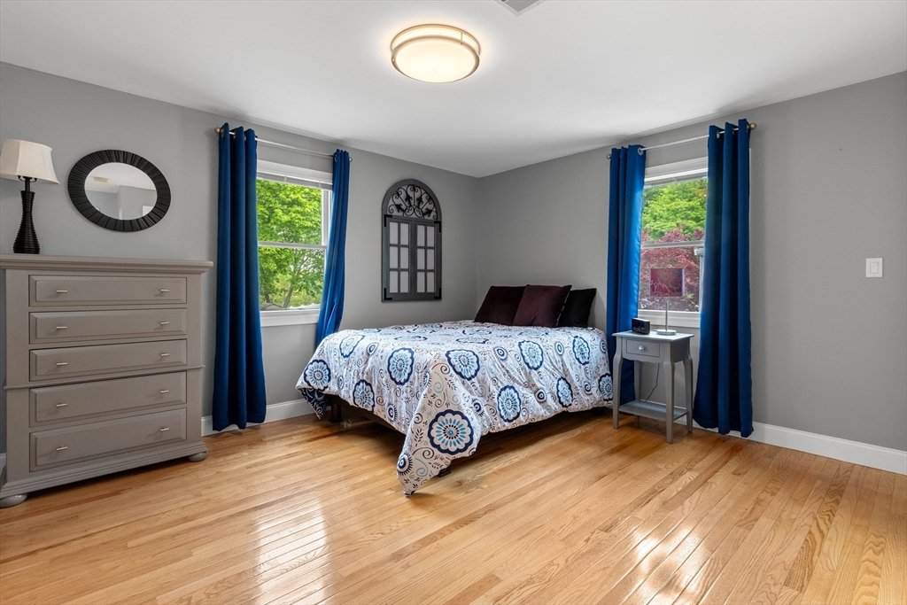 21 Leggs Hill Road Marblehead, MA 01945 - Photo 21 of 38 a bedroom with a bed and a window