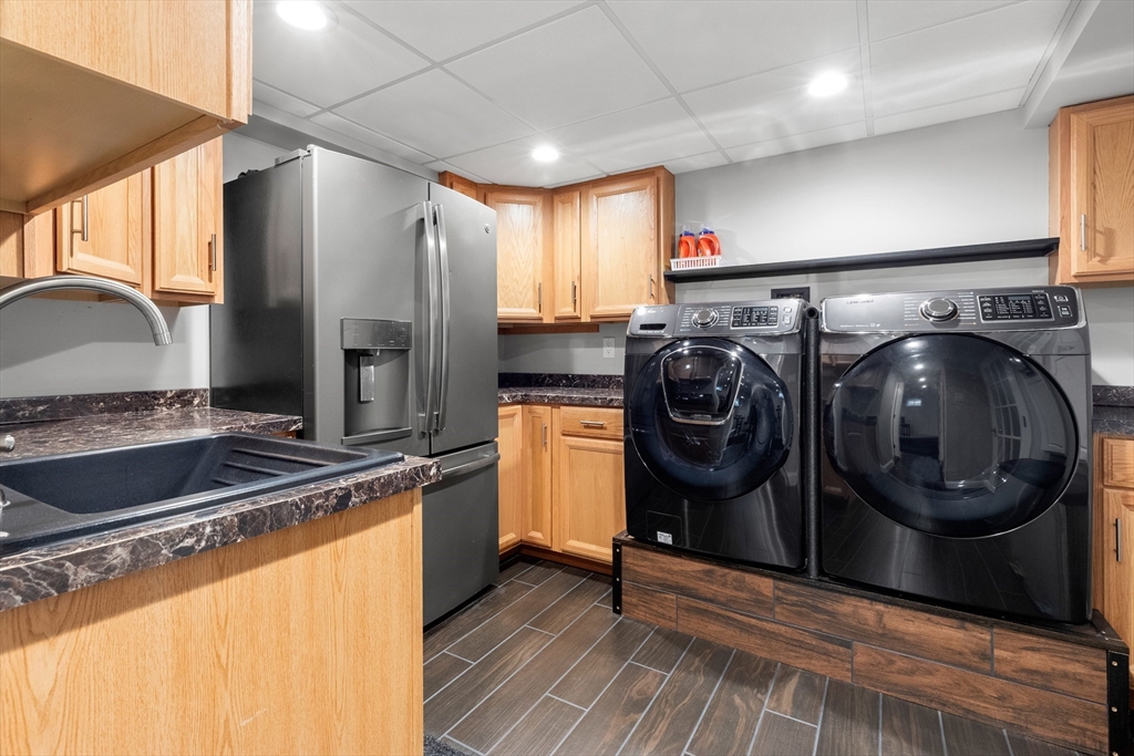 21 Leggs Hill Road Marblehead, MA 01945 - Photo 28 of 38 a kitchen with a refrigerator and a sink