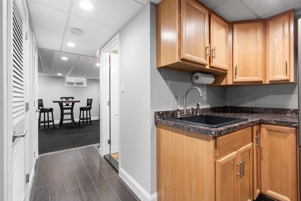 21 Leggs Hill Road Marblehead, MA 01945 - Photo 29 of 38 a kitchen with granite countertop a stove and cabinets