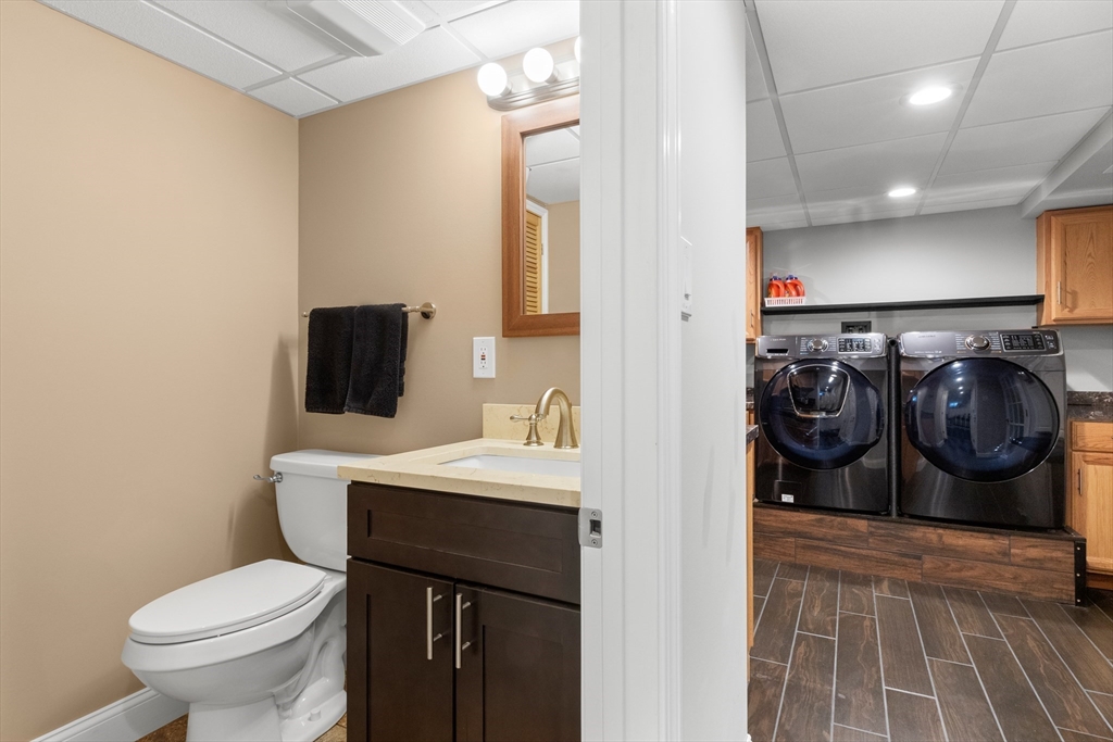 21 Leggs Hill Road Marblehead, MA 01945 - Photo 30 of 38 a bathroom with a sink toilet and shower