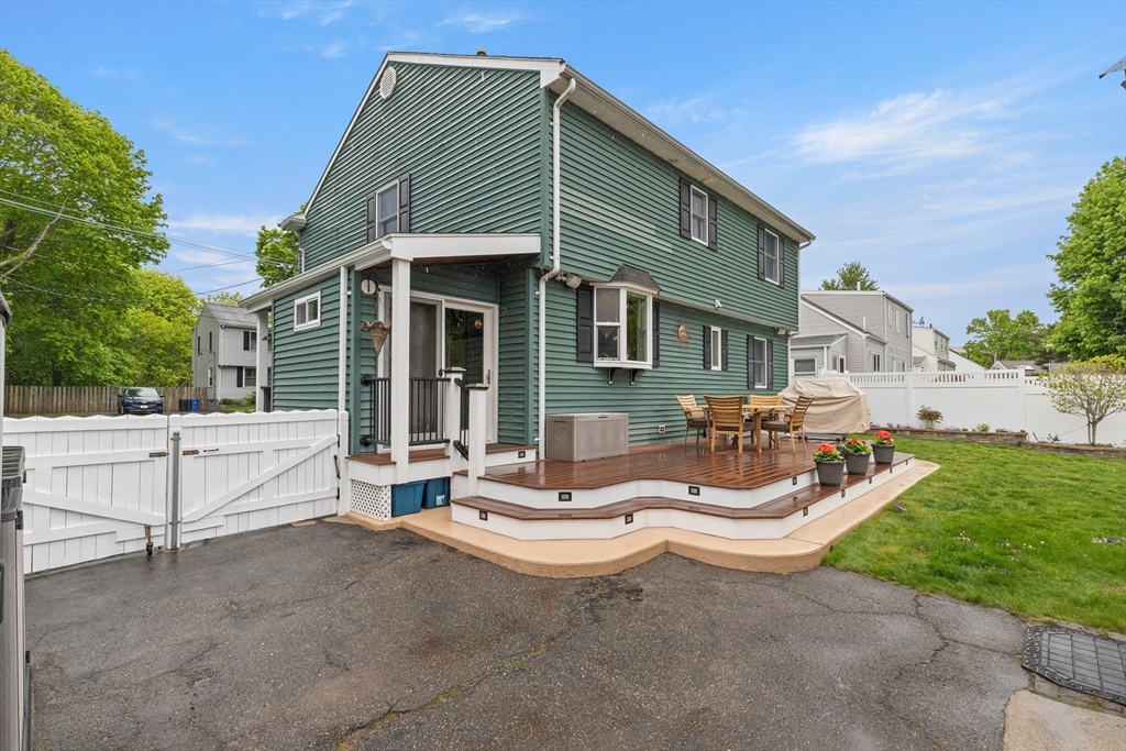 21 Leggs Hill Road Marblehead, MA 01945 - Photo 32 of 38 a view of a house with backyard and sitting area