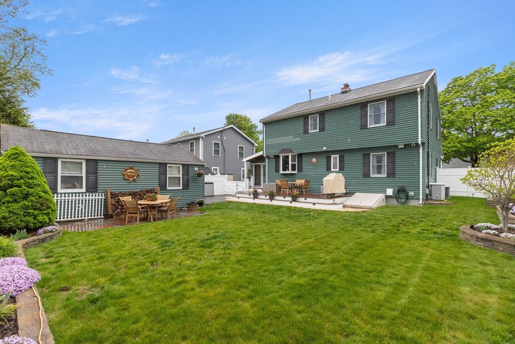 21 Leggs Hill Road Marblehead, MA 01945 - Photo 36 of 38 a front view of a house with patio and garden
