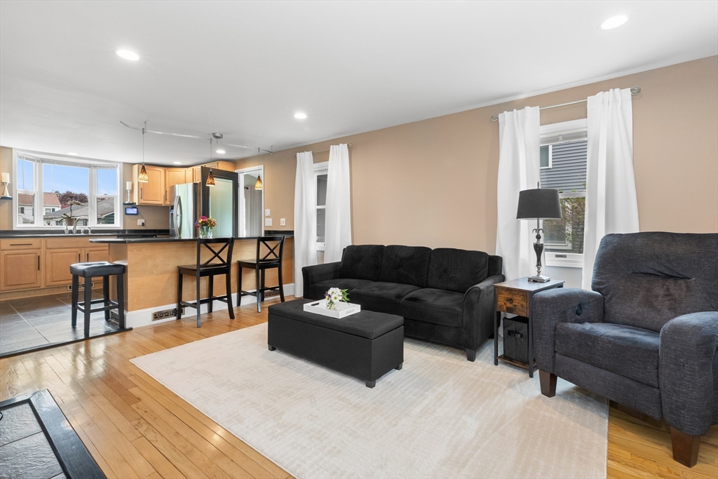 21 Leggs Hill Road Marblehead, MA 01945 - Photo 4 of 38 a living room with furniture and a table
