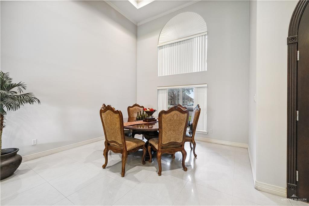 2005 East 28th Street Mission, TX 78574 - Photo 4 of 28 a dining room with furniture and window