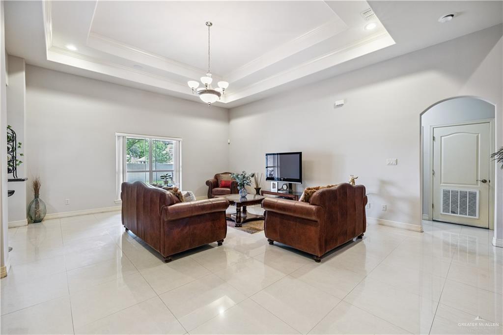 2005 East 28th Street Mission, TX 78574 - Photo 5 of 28 a living room with furniture and a flat screen tv