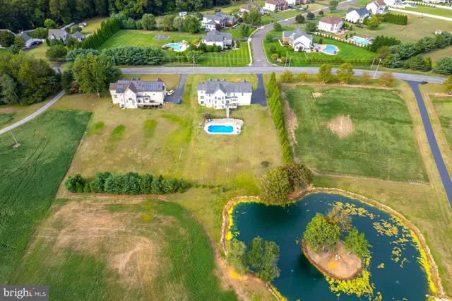 a view of a lake with a big yard